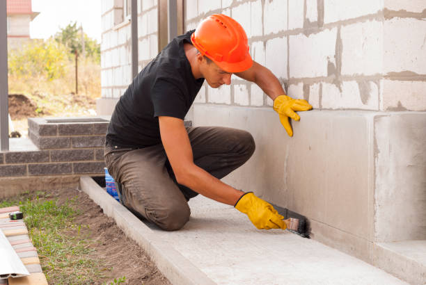 Waterproofing professionals working in Troy, IL